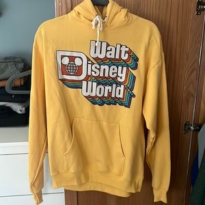 WDW yellow retro sweatshirt, never been worn or washed.